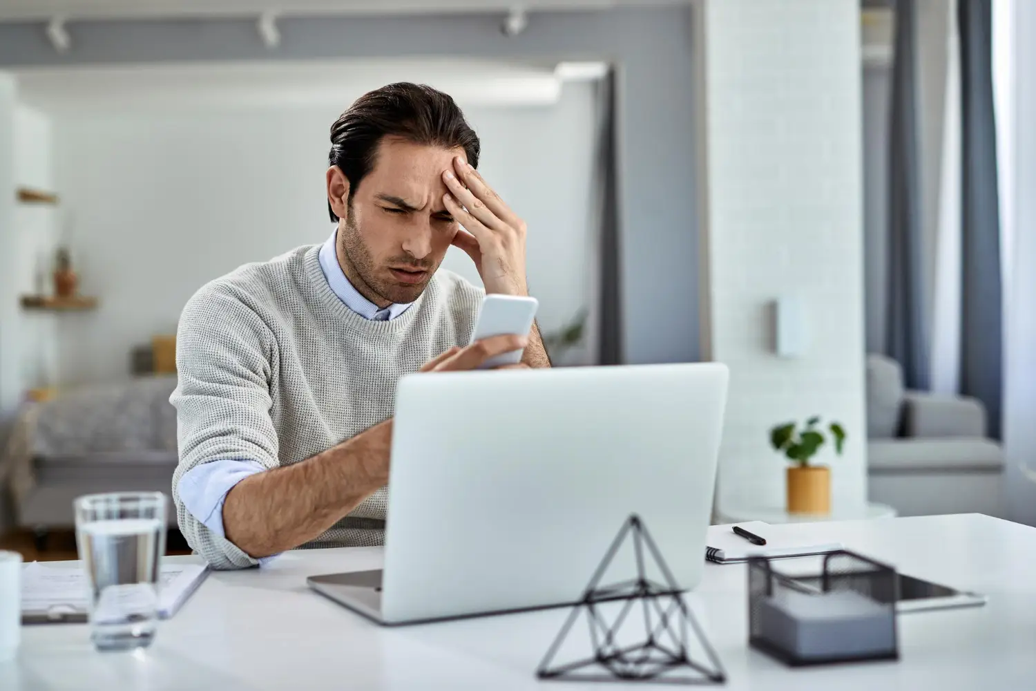 Distraught entrepreneur trying to figure out cybersecurity